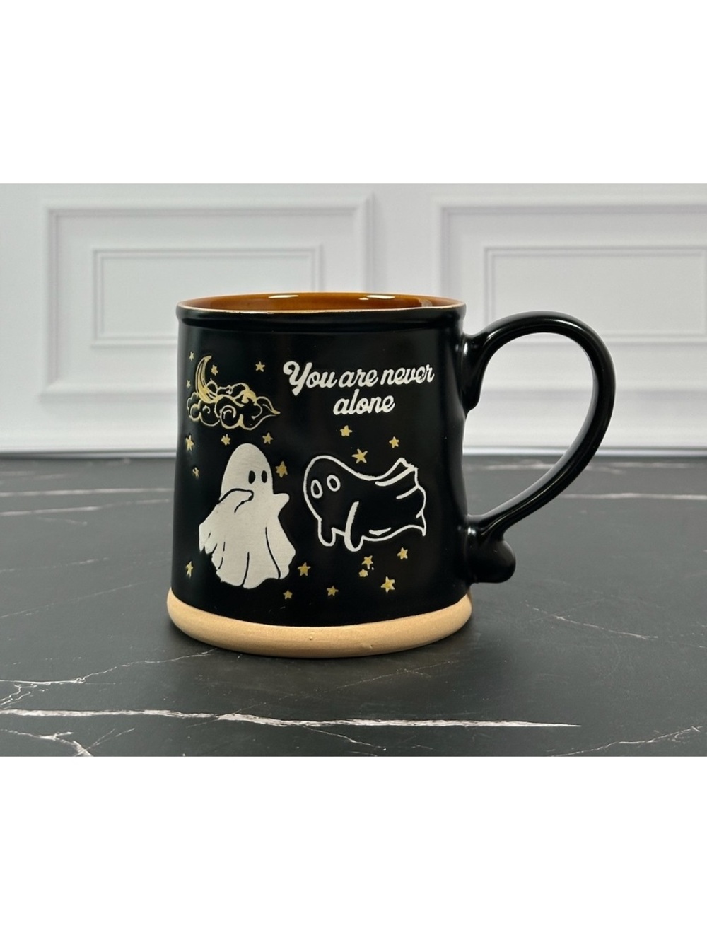 Black Ceramic Coffee Mug with Cute Ghost Design and 'You Are Never Alone' Quote